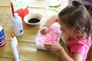 Learn how to make this super easy 3 ingredient Watermelon Slime. It's the perfect sensory activity to pair with the darling book The Watermelon Seed!