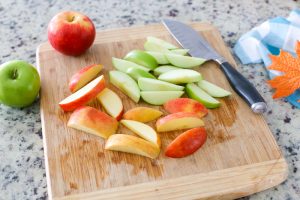 Surprise your kids this Fall with a basket full of Ingredients to make an Easy Kid-Friendly Caramel Apple Bar. Perfect for an afternoon snack or a special gift for teachers and neighbors!