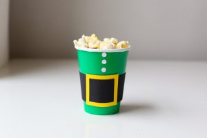 Christmas Movie Night just got more fun with these darling DIY Christmas Popcorn Treat Cups. They pair perfectly with your favorite Christmas movies!