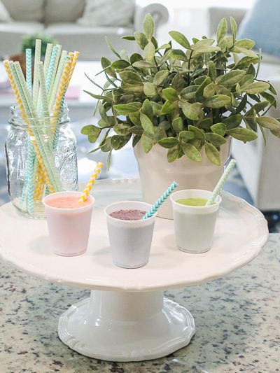 Combine your love for breakfast and your love for family time with this Family Friendly Smoothie Bar. It's perfect for a weekend morning, mid afternoon treat, or even a fun way to mix up the evening. Your family will love this unique idea!