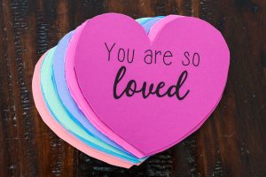 Celebrate Love in Action with this simple Valentine's Day Random Acts of Kindness Family Night. It's the perfect Valentine's Day tradition to start with your family!