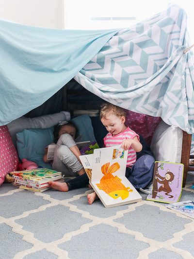 Spending time as a family doesn't have to cost a fortune. This Blanket Fort Family Night is the perfect inexpensive yet fun activity for your family. Grab some blankets, pillows, and a little imagination and get ready to build the best blanket fort ever.