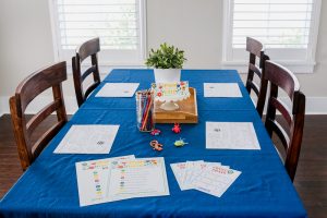 Looking for an out of the box family night activity for Spring? This Spring Mystery Dinner Family Night Activity is a favorite. Your kids will love getting a silly menu and a mixed up dinner surprise. Step by step instructions + FREE Printables so you can easily create lots of laughter and a special memory with your family at home.
