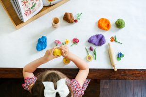 Want to add some pizzazz to your play dough creations? This easy DIY Flower Pot Play Dough Kit is perfect for kids of all ages and so easy to put together. This kit encourages open ended play and imagination as kids build and decorate with the supplies in the box. It would also make the perfect birthday gift for the budding artist in your life.