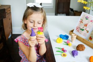 Want to add some pizzazz to your play dough creations? This easy DIY Flower Pot Play Dough Kit is perfect for kids of all ages and so easy to put together. This kit encourages open ended play and imagination as kids build and decorate with the supplies in the box. It would also make the perfect birthday gift for the budding artist in your life.