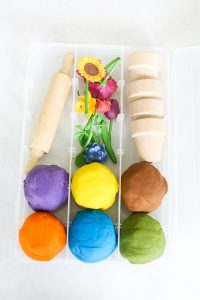 Want to add some pizzazz to your play dough creations? This easy DIY Flower Pot Play Dough Kit is perfect for kids of all ages and so easy to put together. This kit encourages open ended play and imagination as kids build and decorate with the supplies in the box. It would also make the perfect birthday gift for the budding artist in your life.