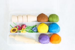 Want to add some pizzazz to your play dough creations? This easy DIY Flower Pot Play Dough Kit is perfect for kids of all ages and so easy to put together. This kit encourages open ended play and imagination as kids build and decorate with the supplies in the box. It would also make the perfect birthday gift for the budding artist in your life.